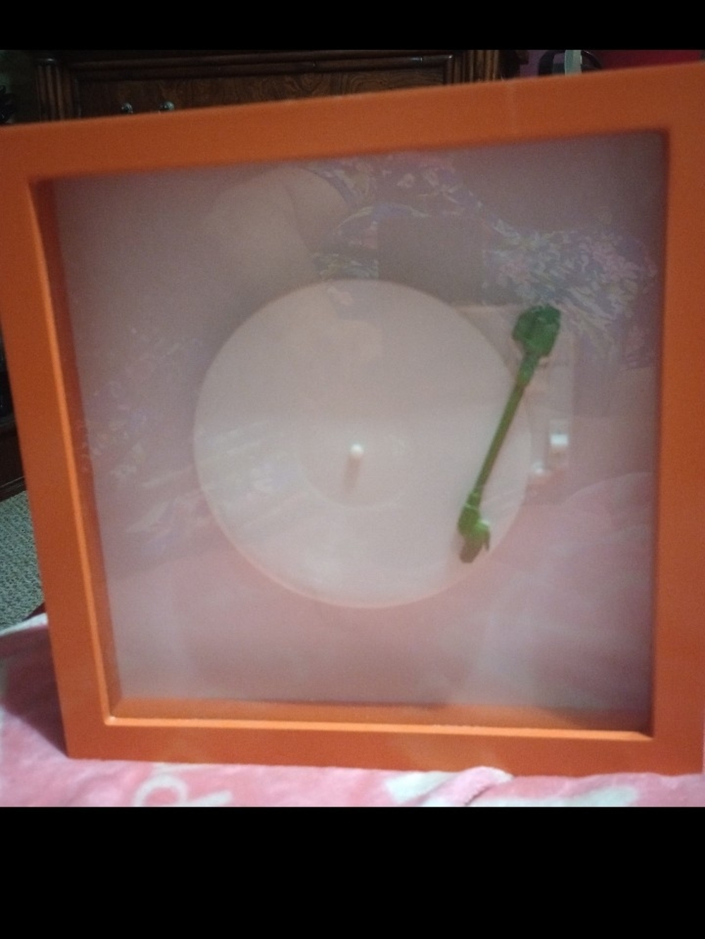 Super cool shadowbox wall hanging featuring white and green turntable inside ora